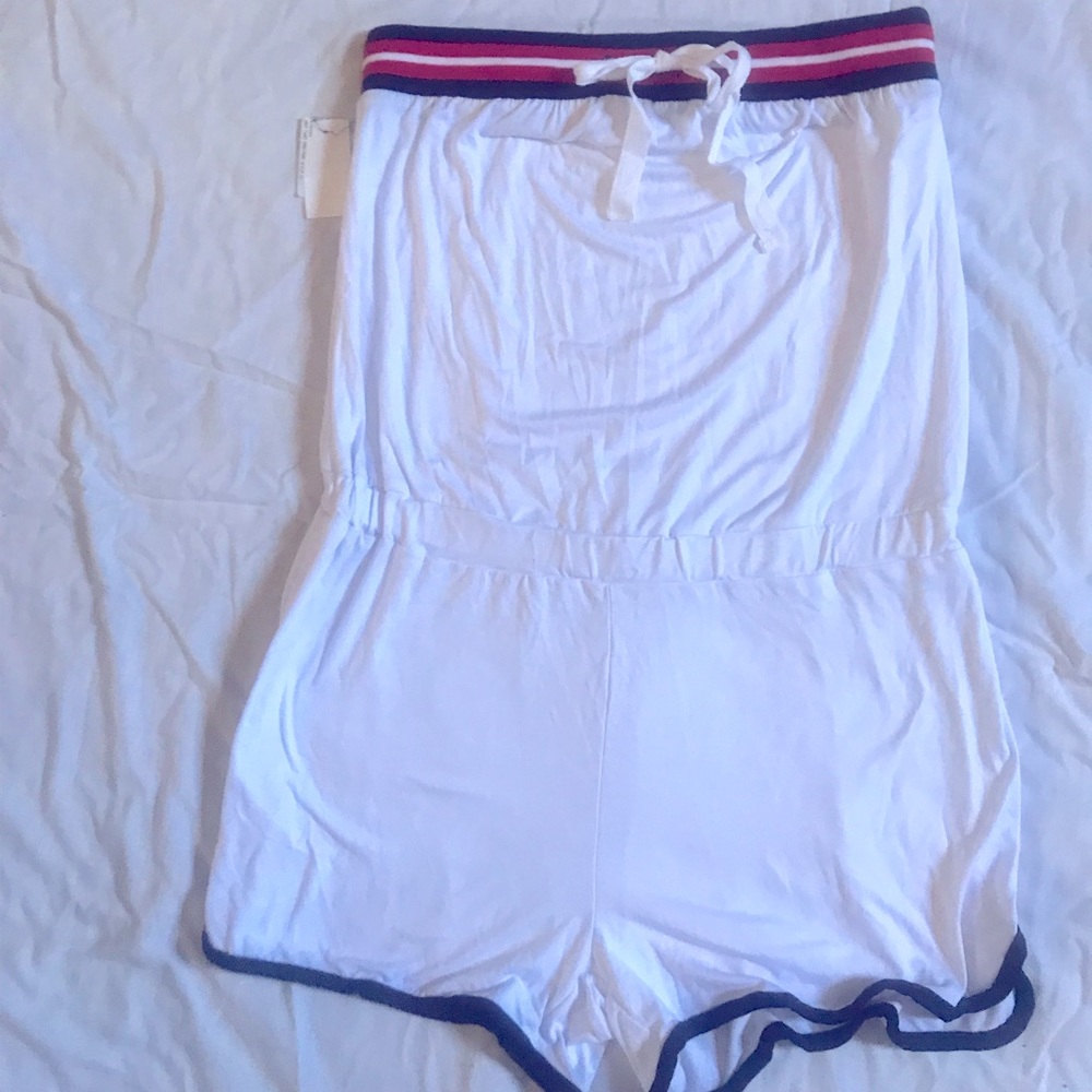 Really cute romper perfect for summer or swimsuit cover up new with tags